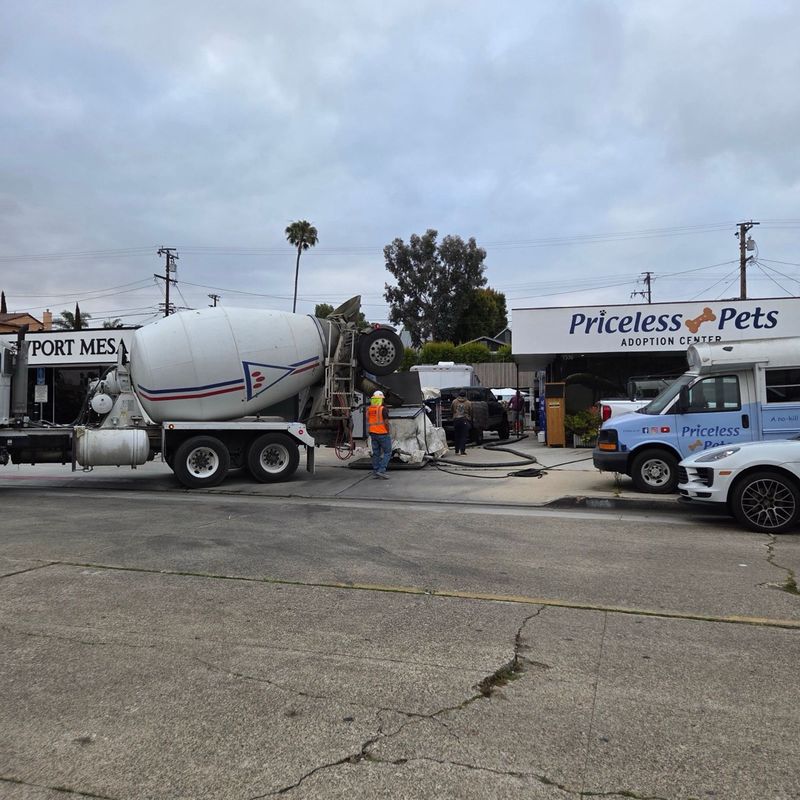 A concrete truck delivers material outside the Priceless Pets adoption center
